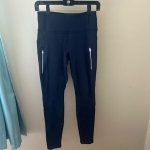 Athleta Navy High-Waisted Leggings with Zipper Pockets